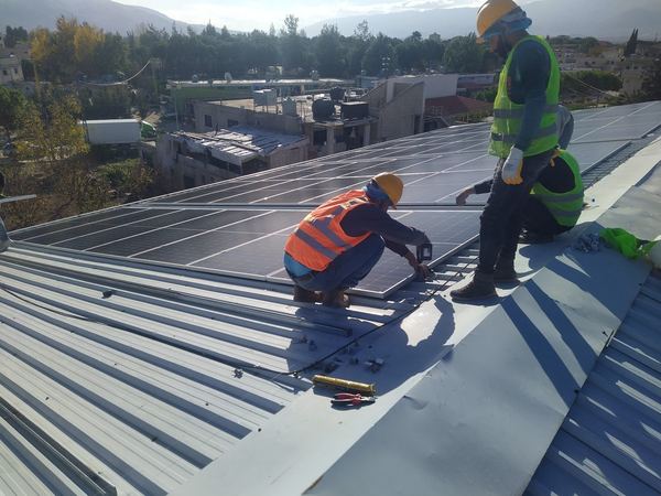 Fixing panels on the metal roof