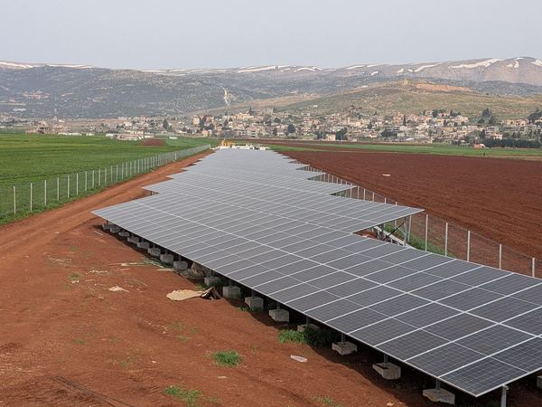 Finished ground-mounted rows across the farmland