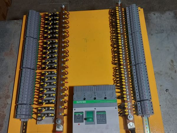 Combiner board with string protection and main breaker
