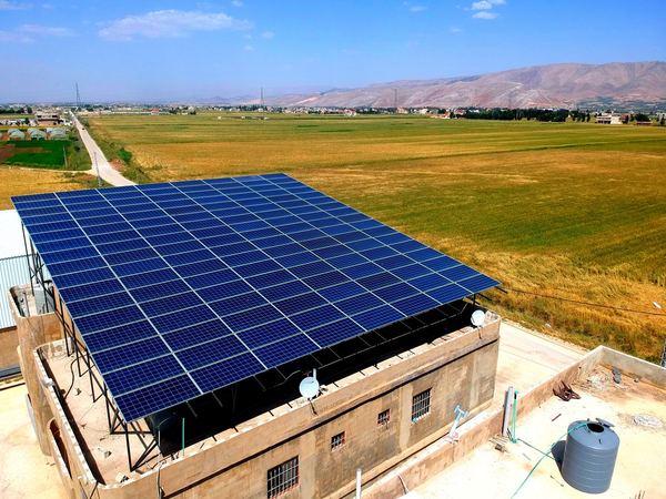 Raised rooftop array over the fields