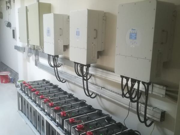 Three hybrid inverters and the battery rack