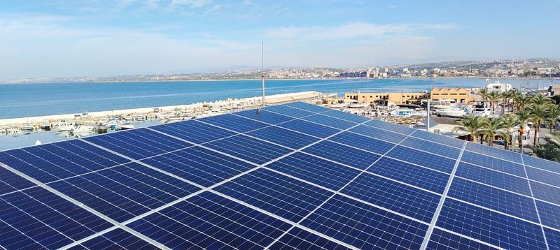 Rooftop array overlooking the sea