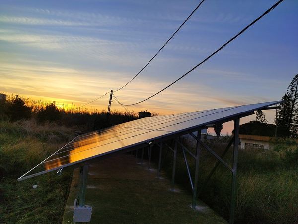 Ground-mounted array at sunset